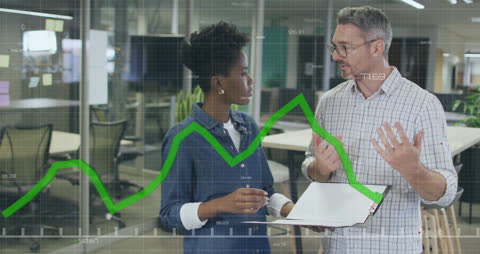 Colleagues Discussing Business Data Trends with Graph Overlay