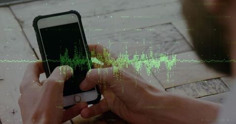 Person using smartphone with digital waveform hologram