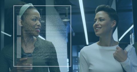 Diverse professionals exploring financial data overlay in modern office