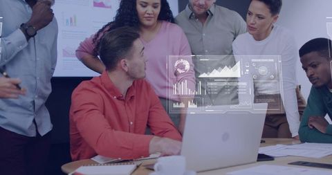 Leading team collaboration around table with laptop analytics HUD and charts