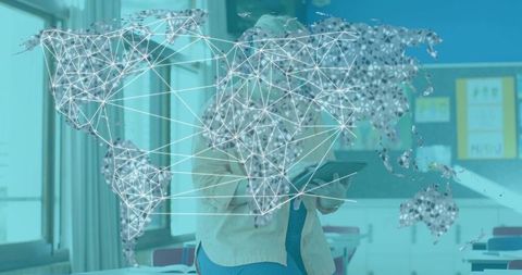 Teacher Holding Tablet Presenting Global Connectivity in Classroom with World Map Overlay