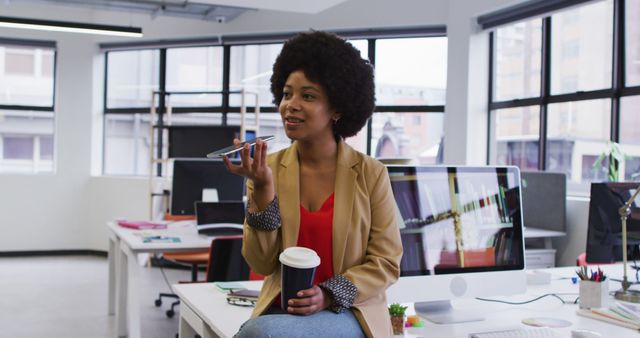 Confident Professional Woman Using Smartphone in Modern Office - Download Free Stock Images Pikwizard.com