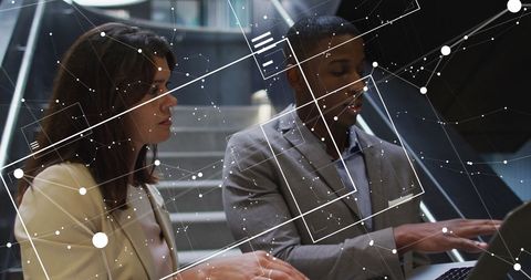 Team Collaborating with Digital Data Insight Interface in Modern Office