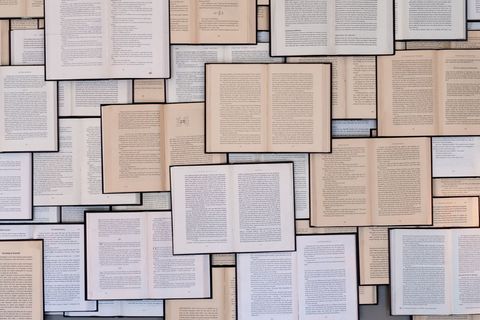 Abstract composition of open books with visible text
