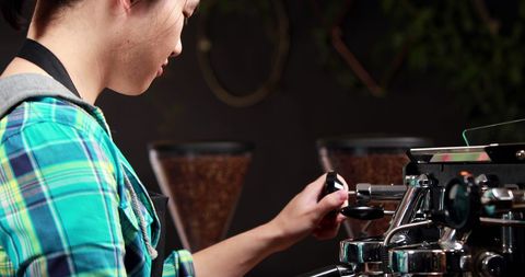 skilled barista operating espresso machine in cafe - Download Free Stock Images Pikwizard.com