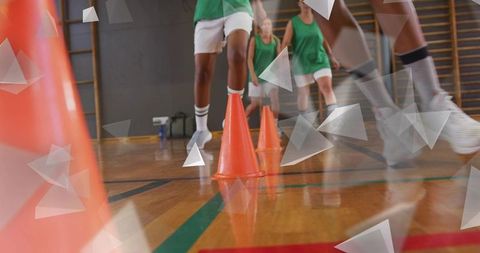 Athletes in Action Executing Footwork Drills on Indoor Court