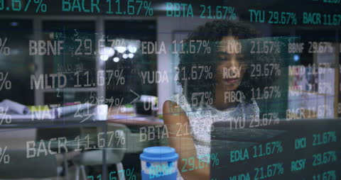 African American Businesswoman Analyzing Digital Data on Laptop