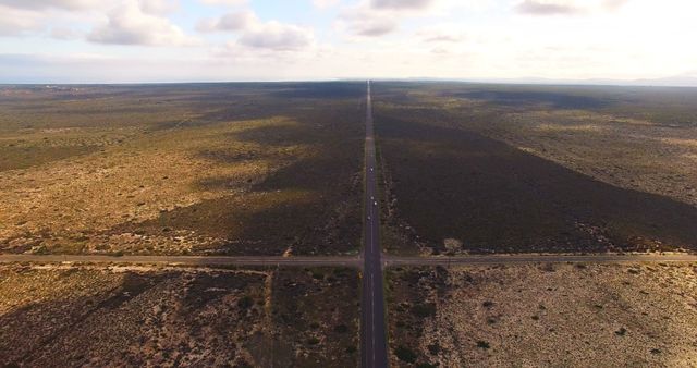 Aerial View of Isolated Desert Road Stretching to Horizon - Download Free Stock Images Pikwizard.com