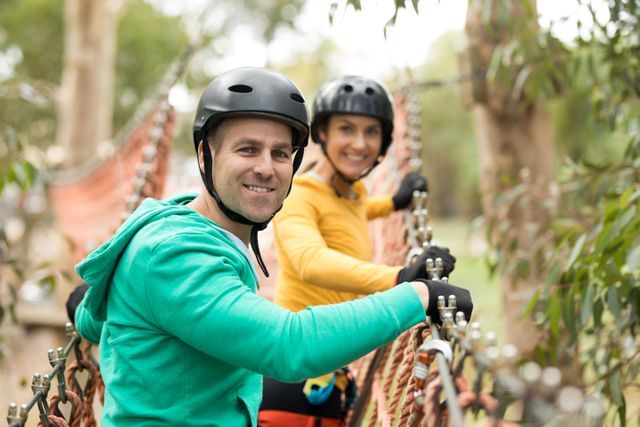This image is perfect for promoting outdoor adventure activities, team-building events, and active lifestyle campaigns. It can also be used in travel brochures, adventure park advertisements, and social media posts highlighting fun and bonding experiences in nature.