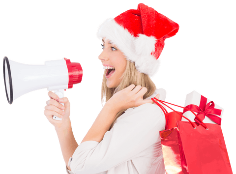 Joyful blonde in santa hat holding megaphone and gift bags transparent