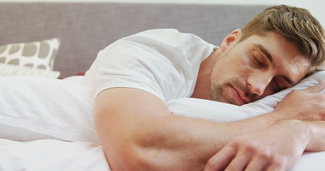 Young Man Sleeping Peacefully on Bed with White Pillow - Download Free Stock Images Pikwizard.com