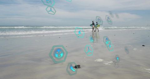 Surfers walking along reflective wet sand with holographic tech icons and overcast sky