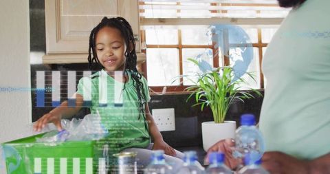 Child sorting recyclables with parent in sunlit kitchen teaching eco habits at home