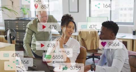 Diverse Team Analyzing Social Media Engagement Notifications