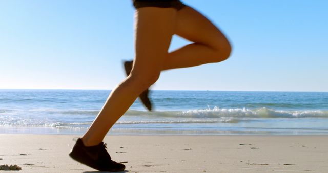 Woman Running on Beach on Sunny Day - Download Free Stock Images Pikwizard.com