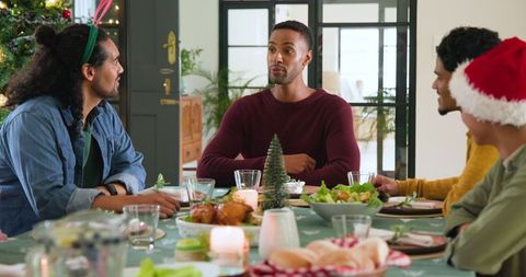 Diverse Friends Celebrating Holidays with Festive Meal