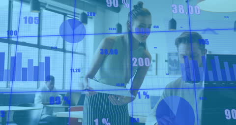 Business Team Analyzing Data with Digital Graphs Overlay