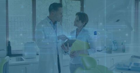 Dental Professionals Utilizing Digital Technology in Modern Clinic