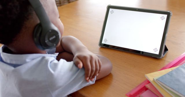 Child Learning Online with Tablet and Headphones - Download Free Stock Images Pikwizard.com