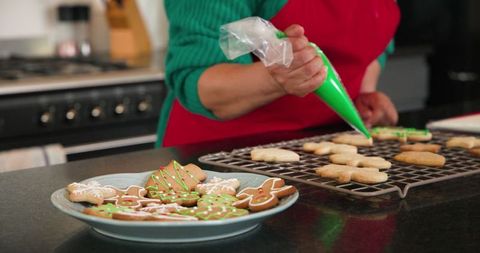 Festive cookie decorating in home kitchen