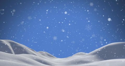 Snowflakes Falling Over Winter Landscape and Clear Blue Sky