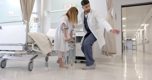 Physical Therapist Assisting Patient with Walking in Hospital Room - Download Free Stock Images Pikwizard.com