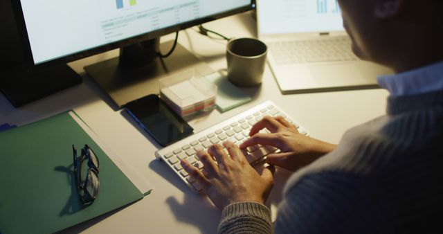 Typing Financial Data on Keyboard at Desk with Multiple Monitors - Download Free Stock Images Pikwizard.com