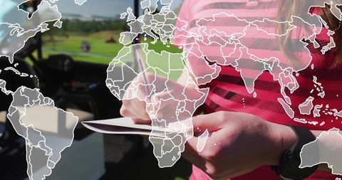 Writing on tablet with stylus by steering wheel with world map overlay for travel planning