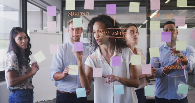 Diverse Team Collaborating on Agile Project Planning with Sticky Notes - Download Free Stock Images Pikwizard.com