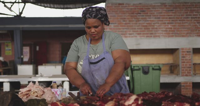 Skilled Butcher Preparing Meat at Market Stall - Download Free Stock Images Pikwizard.com