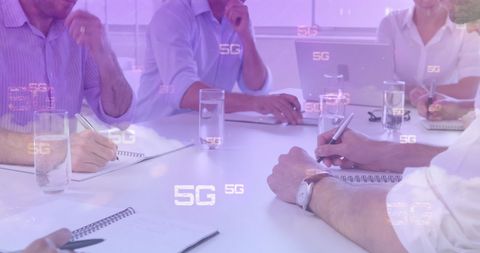 5G Concept with Business Professionals in Meeting