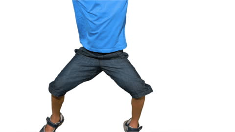 Happy Child Energetically Jumping in Studio