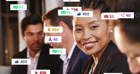 Smiling Professional Analyzing Social Media Metrics in Modern Office