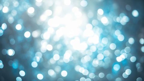 Abstract Bokeh Luminous Blue Lights on Dark Background