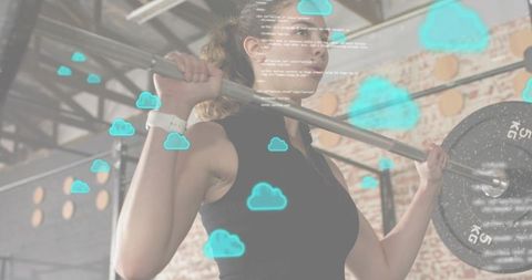 Female athlete performing back squat with loaded barbell in industrial gym, teal overlays