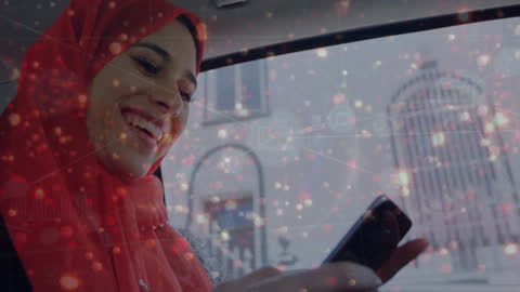 Tech-Savvy Woman in Hijab Using Smartphone with Digital Effects