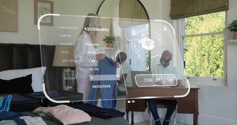 Couple using ar shopping overlay while organizing wardrobe in bedroom home office