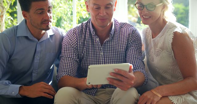 Group of Professionals Using Digital Tablet in Office Meeting - Download Free Stock Images Pikwizard.com