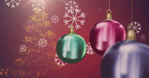 Colorful Christmas Baubles with Snowflakes on Red Background