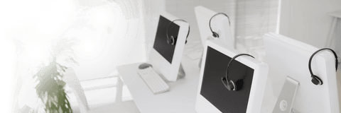 transparent office computers with headsets on desk - Download Free Stock Videos Pikwizard.com