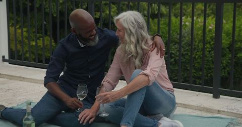 Romantic Couple Enjoying Wine Outdoors in Shared Moment