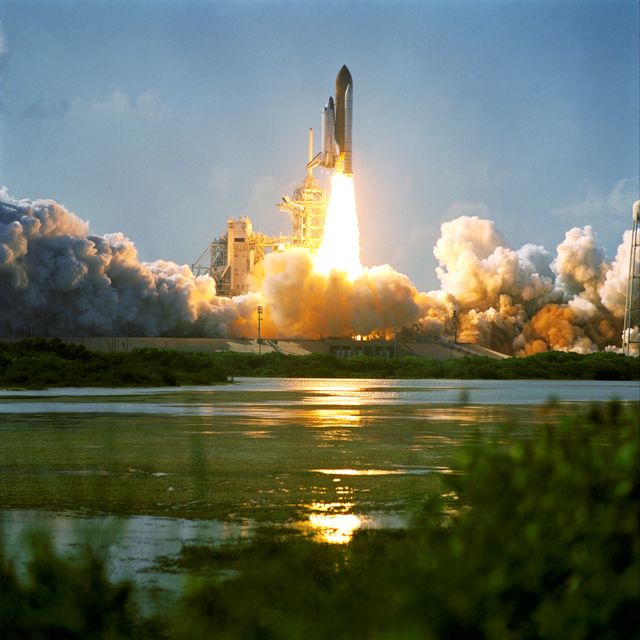 STS112-S-012 (7 October 2002) --- An automated camera records the launch of mission STS-112, the 15th assembly flight to the International Space Station. Liftoff from Launch Pad 39B occurred at 3:46 p.m. (EDT), October 7, 2002. Atlantis carried the S1 Integrated Truss Structure and the Crew and Equipment Translation Aid (CETA) Cart A. The CETA is the first of two human-powered carts that will ride along the ISS railway, providing mobile work platforms for future spacewalking astronauts. On the 11-day mission, three spacewalks were successful in attaching the S1 truss to the Station and performing other scheduled ISS work. The STS-112 crew members of Atlantis are  Jeffrey S. Ashby, commander; Pamela A. Melroy, pilot; and David A. Wolf, Piers J. Sellers, Sandra H. Magnus and Rosaviakosmos' Fyodor N. Yurchikhin, all mission specialists.
