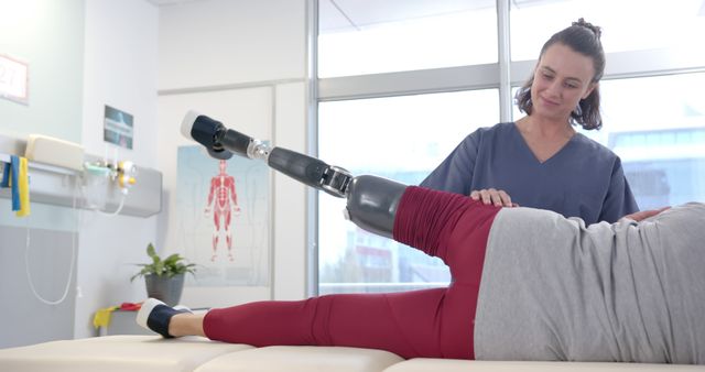 Physiotherapist Working with Person with Prosthetic Leg in Modern Rehabilitation Center - Download Free Stock Images Pikwizard.com