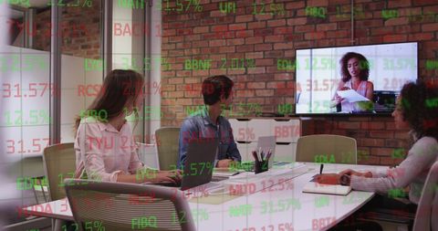 Multiracial team video conferencing with stock market overlay
