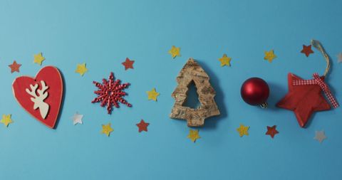 Festive Christmas Decorations on Vibrant Blue Background - Download Free Stock Images Pikwizard.com