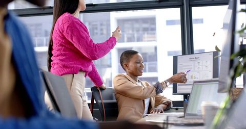 Diverse Business Team Collaborating in Modern Office Setup