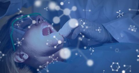 Virtual Reality Dental Exam Interface with Molecular Graphic Overlay