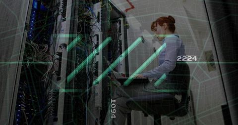 Female technician troubleshooting server racks with laptop and holographic ar overlays