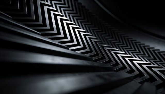 Curved chevron metal fins creating diagonal zigzag pattern for industrial minimalist design