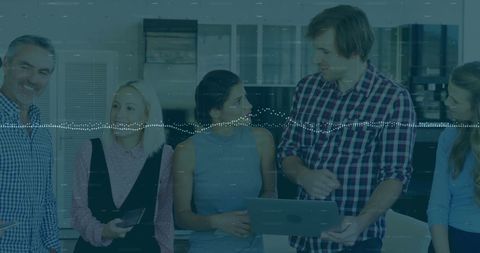 Diverse Business Team Collaborating Over Financial Data Projection - Download Free Stock Images Pikwizard.com